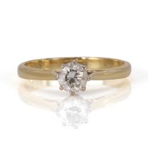 An 18ct single stone diamond ring,