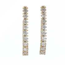A pair of 9ct gold diamond bar hoop earrings,