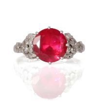 A white gold synthetic ruby and diamond set ring,