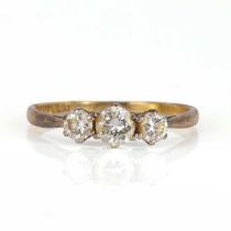 A graduated three stone diamond ring,