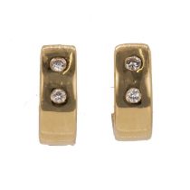 A pair of 18ct gold diamond cuff earrings, retailed by Susanna Lovis,