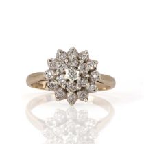 A 9ct gold small diamond cluster ring,