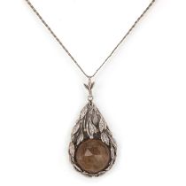 An Arts and Crafts silver and smoky quartz set pendant, attributed to Bernard Instone,