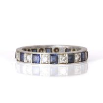 A diamond and sapphire eternity ring,