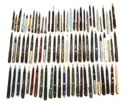 A collection of fountain pens, rollerballs and propelling pencils,