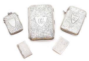 A group of silver cases