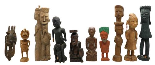 A group of ten carved wood figures,