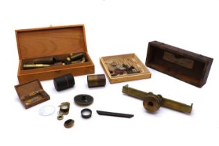 A collection of mixed brass microscope lenses and accoutrements,