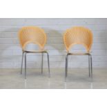 A pair of 'Trinidad Model 3298' stacking chairs,