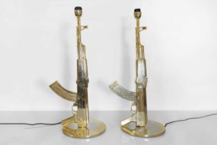 A pair of Italian 'Gun' table lamps,