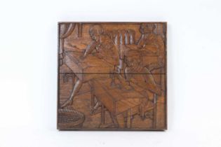 A carved oak panel,