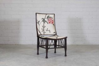 A mahogany Thebes chair,