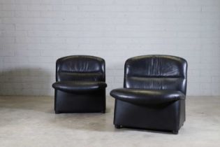 A pair of Italian lounge chairs,