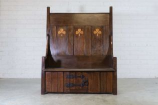 A Liberty & Co. inlaid oak hall settle,