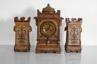 A Doulton Lambeth clock garniture,