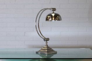 A large chrome 'Arc' desk lamp,