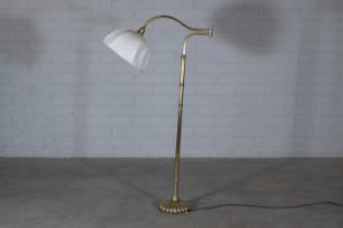 A gilt-brass adjustable standard lamp,