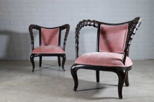 A pair of Thomasville 'Ernest Hemingway' carved alder armchairs,
