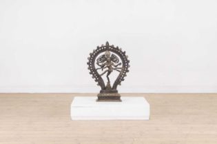 A patinated brass figure of Shiva Natarāja,