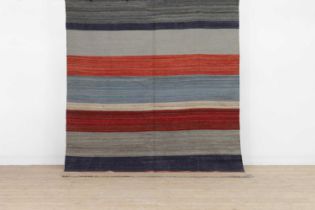 A flat-weave wool rug,