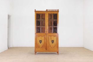 A satinwood cabinet,