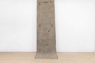 A flat-weave wool runner,