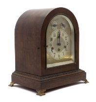 An oak mantle clock,
