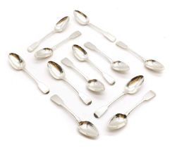 A composed set of twelve silver Fiddle pattern table spoons