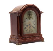 An oak mantle clock