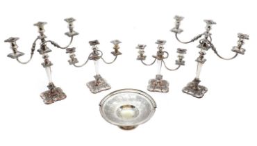 Two pairs of Sheffield plated three-branch candlebra,