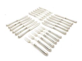A composed set of twelve fish knives and forks