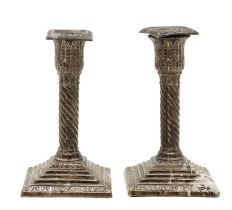 A pair of Victorian silver candlesticks