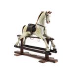 A painted wood rocking horse