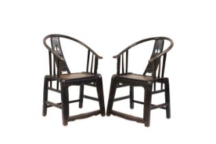 A pair of Chinese hardwood chairs