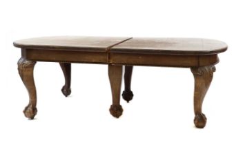 A George II style mahogany extending dining table
