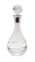 A silver mounted cut glass decanter