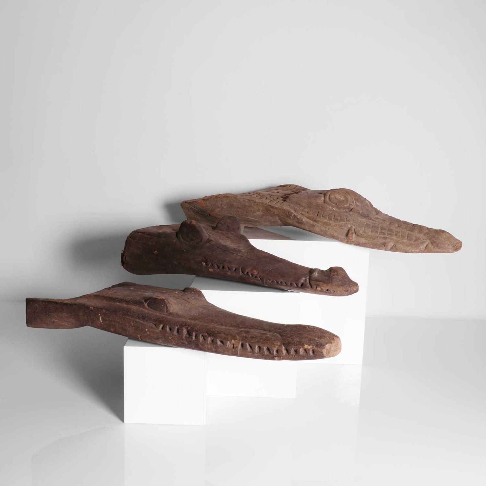 A group of three carved crocodile boat prows, - Image 6 of 7