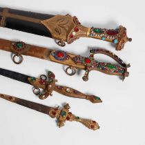 A collection of four Victorian theatrical weapons,