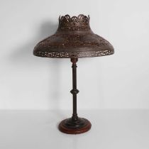 A Cairo ware pierced brass lamp,