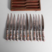 A cased set of twelve St-Cloud soft paste porcelain-handled knives,