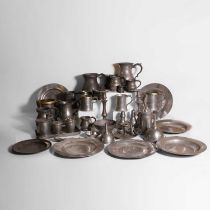 A large collection of pewter items,
