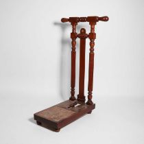 A late Victorian mahogany boot jack,