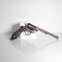 An 11mm Gasser six-shot service revolver,