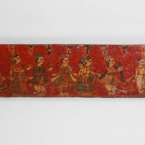 A polychrome-painted hardwood frieze panel,