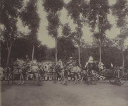 A framed photograph of the Maharajah Nizam of Hyderabad and his entourage,