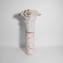 A two-part glazed earthenware column,