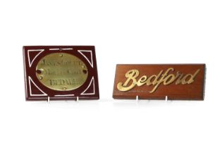 Two brass plaques,