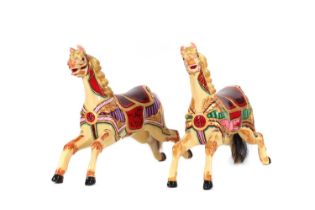 An ornate pair of juvenile 'Dobby' horse carousel mounts by C J Spooner,