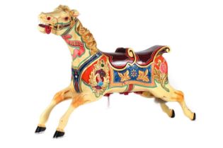 A large double-seated fairground carousel galloper horse by F Savage & Co.