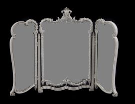 A carved and painted dressing mirror